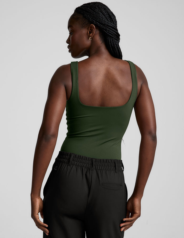 green double-layered square neckline bodysuit.