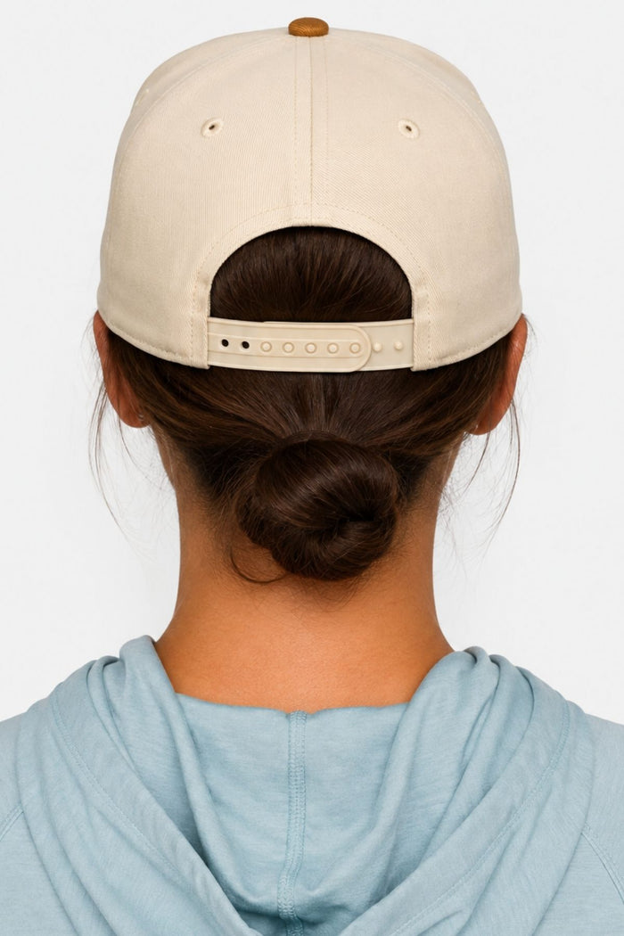 Side profile of the Dolly Vee Twill Trucker Hat
