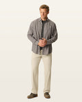 Front view of model wearing Cloud Easy Khakis, Classic Fit.