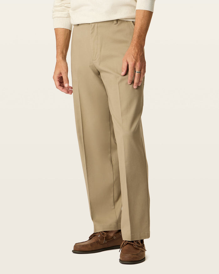 Side view of model wearing Khaki Easy Stretch Khakis, Relaxed Fit.