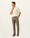 Front view of model wearing Dark Pebble Easy Khakis, Slim Fit.