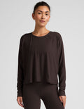 brown long sleeve crew neck top.