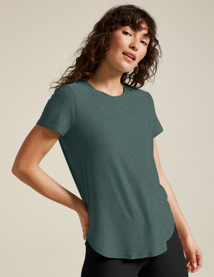 blue short sleeve crew-neck athleisure top.