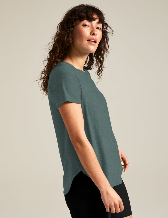 blue short sleeve crew-neck athleisure top.