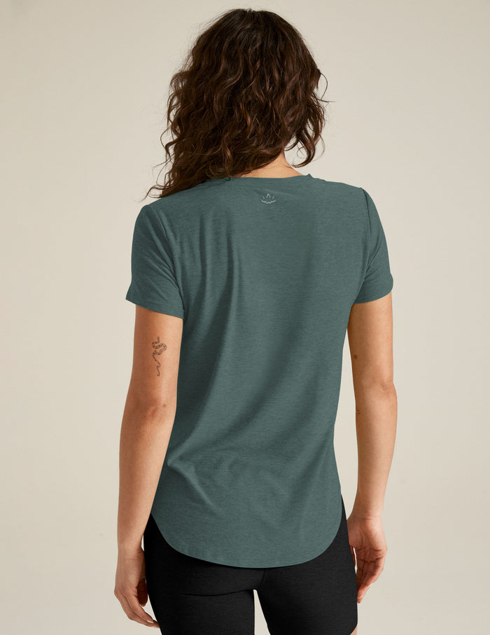 blue short sleeve crew-neck athleisure top.