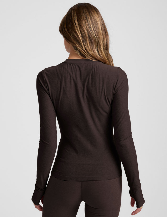 brown crew neck long sleeve with thumb holes.