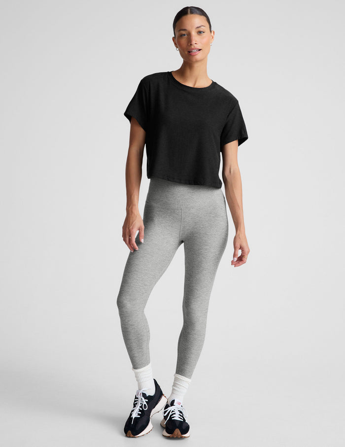 black relaxed fit cropped tee with a scoop neckline.