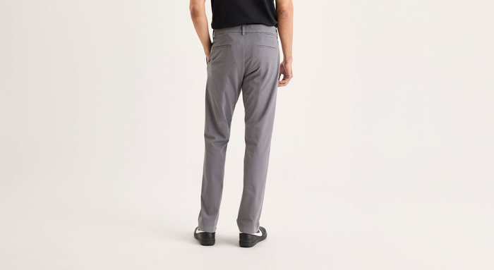 Back view of model wearing Car Park Grey Go Activeflex Chino, Slim Fit.