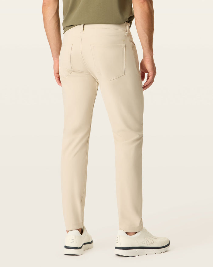 Back view of model wearing Sahara Khaki Go Pant, Slim Fit with Airweave.