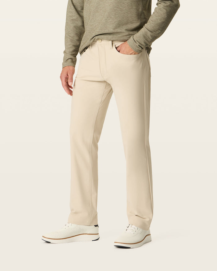 Side view of model wearing Sahara Khaki Go Airweave 5-Pocket, Straight Fit.
