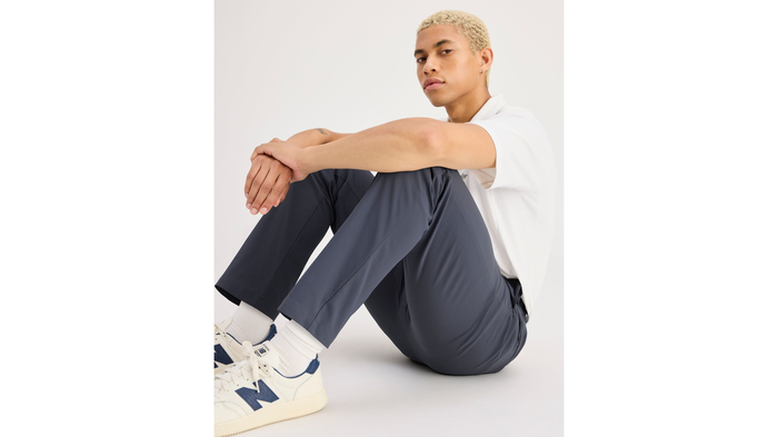 View of model wearing Ombre Blue Go Airweave Chino, Slim Fit.