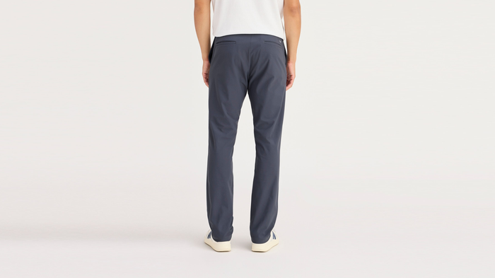 Back view of model wearing Ombre Blue Go Airweave Chino, Slim Fit.