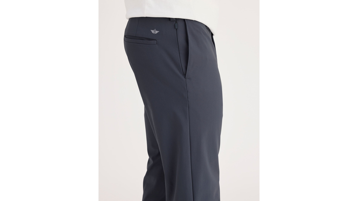 Side view of model wearing Ombre Blue Go Airweave Chino, Slim Fit.