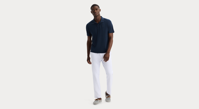 View of model wearing Navy Blazer Go Polo, Regular Fit.