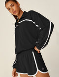 black zip-up jacket with white lining.