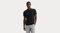 Front view of model wearing Beautiful Black Go Tee, Slim Fit.
