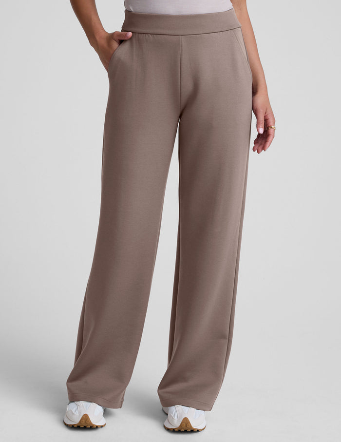 Beige In The Flow Wide Leg Pant with a high-rise elastic waistband, front slant pockets, and a full-length relaxed fit.