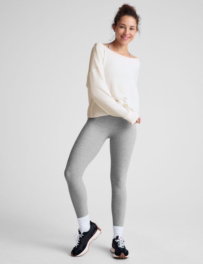 white boatneck long sleeve pullover.