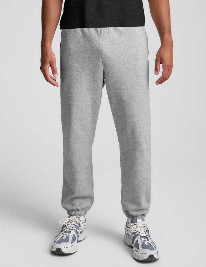 Light grey marled Classic Fleece Men's Jogger featuring a relaxed fit, elastic waistband, and gathered ankle cuffs.