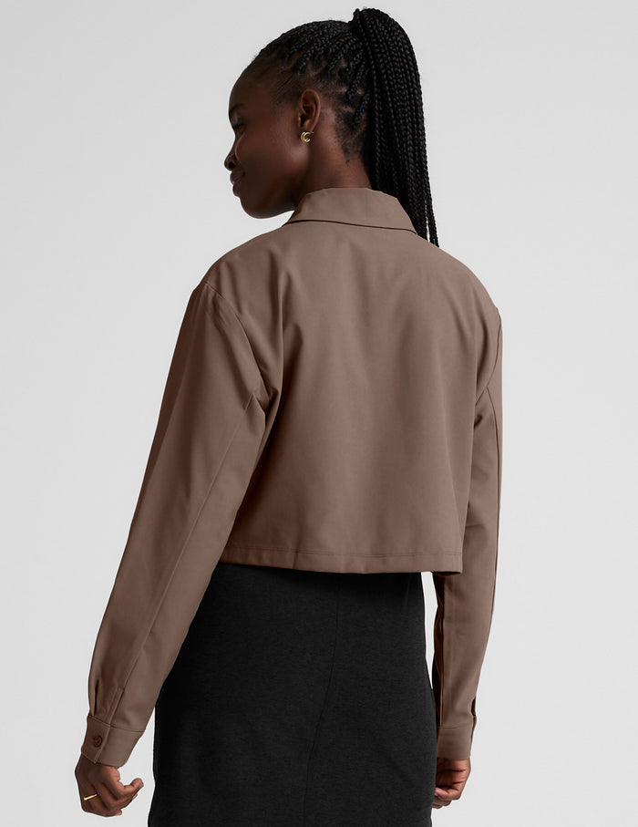 brown button down cropped jacket.