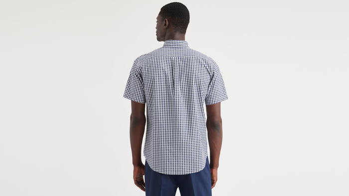 Back view of model wearing Basinni Navy Blazer Essential Button-Up Shirt, Classic Fit.