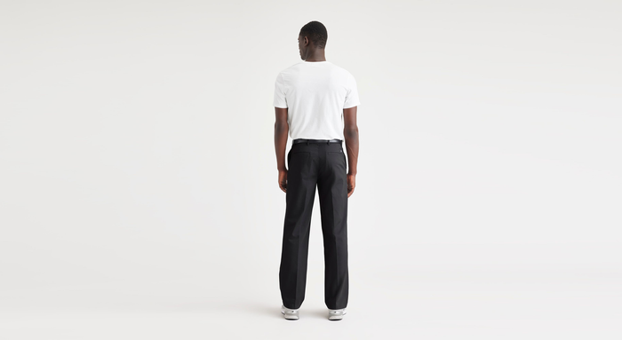 Back view of model wearing Beautiful Black Essential Chinos, Classic Fit.
