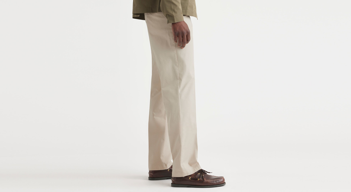 Side view of model wearing Sahara Khaki Essential Chinos, Classic Fit.
