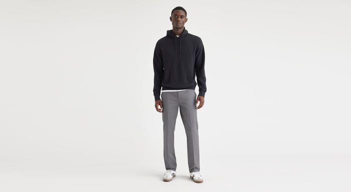 View of model wearing Car Park Grey Essential Chinos, Straight Fit.