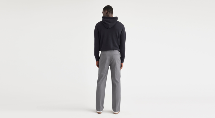 View of model wearing Car Park Grey Essential Chinos, Straight Fit.