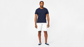 Front view of model wearing White Cap Perfect 10.5" Shorts.