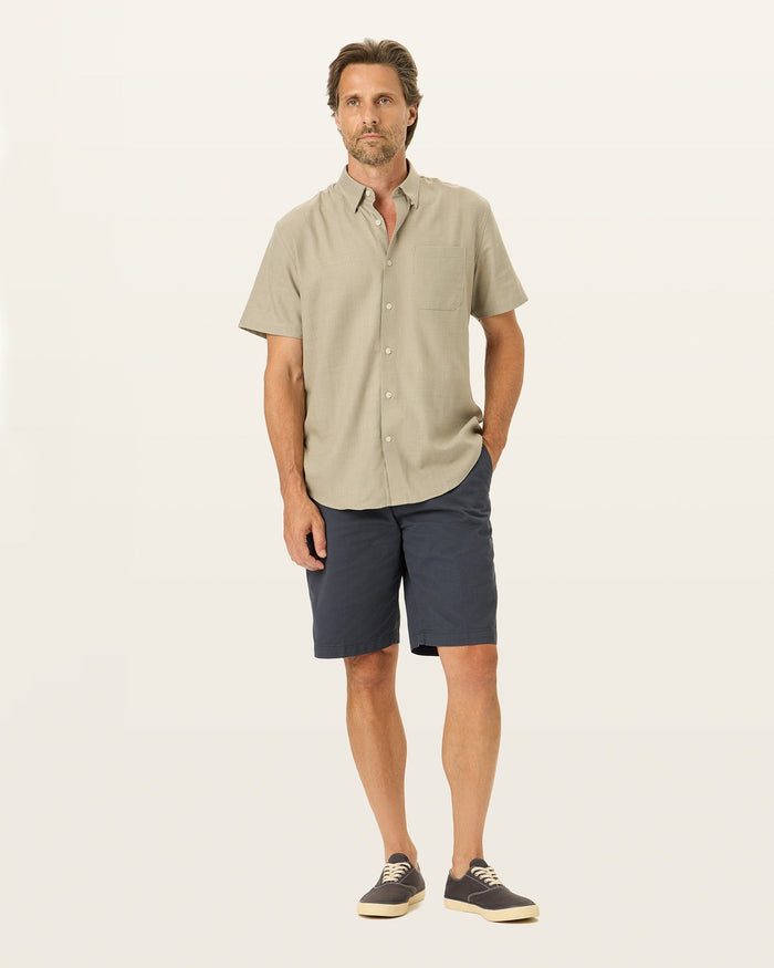 Front view of model wearing Maritime Perfect 10.5" Shorts.