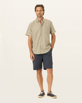 Front view of model wearing Maritime Perfect 10.5" Shorts.