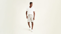Front view of model wearing Porcelain Khaki Perfect 10.5" Shorts.