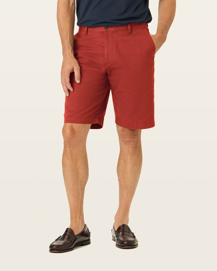 Back view of model wearing Bank Red Perfect 10.5" Shorts.