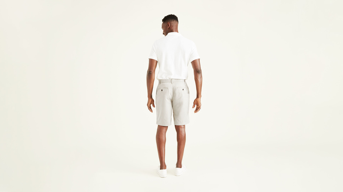 Back view of model wearing Porcelain Khaki Perfect 10.5" Shorts.