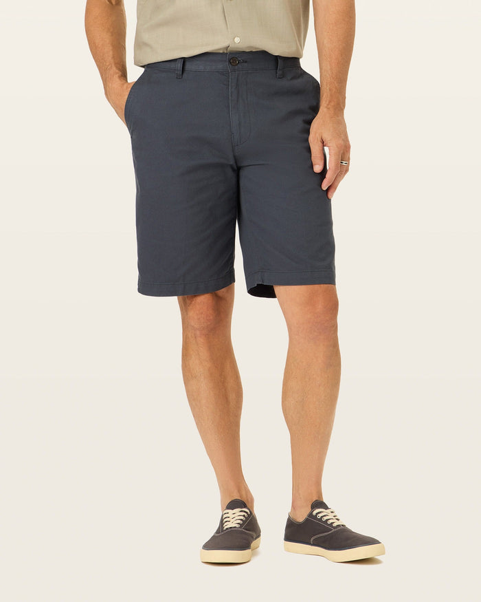 Front view of model wearing Maritime Perfect 10.5" Shorts.