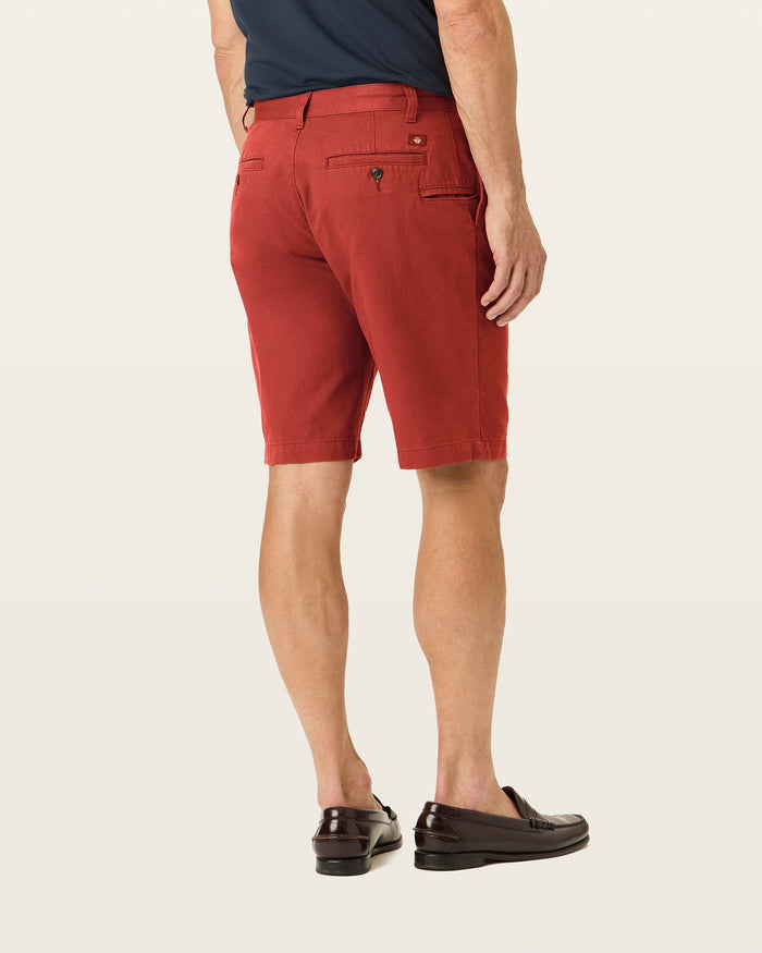 View of model wearing Bank Red Perfect 10.5" Shorts.
