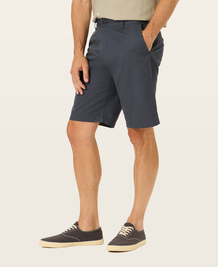 Side view of model wearing Maritime Perfect 10.5" Shorts.