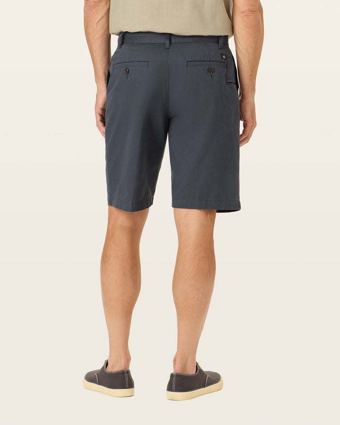 Back view of model wearing Maritime Perfect 10.5" Shorts.
