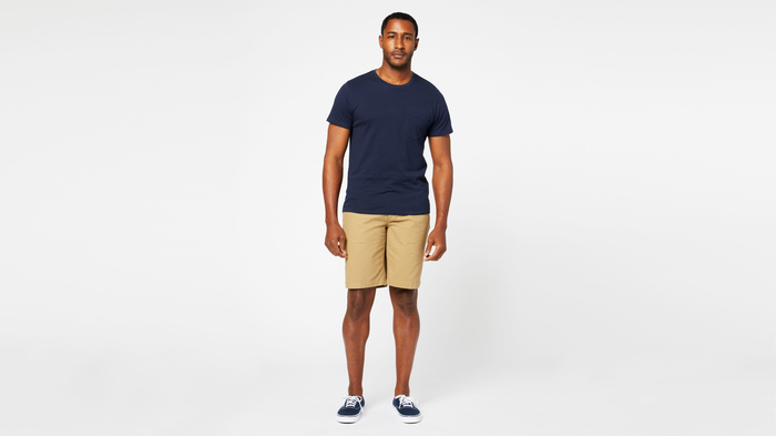 View of model wearing New British Khaki Perfect 8" Shorts.