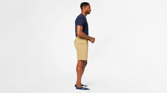 View of model wearing New British Khaki Perfect 8" Shorts.