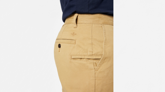 View of model wearing New British Khaki Perfect 8" Shorts.