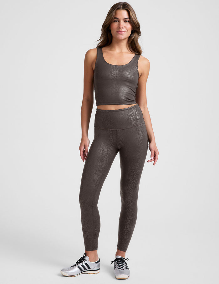 brown viper printed high-waisted midi length leggings.