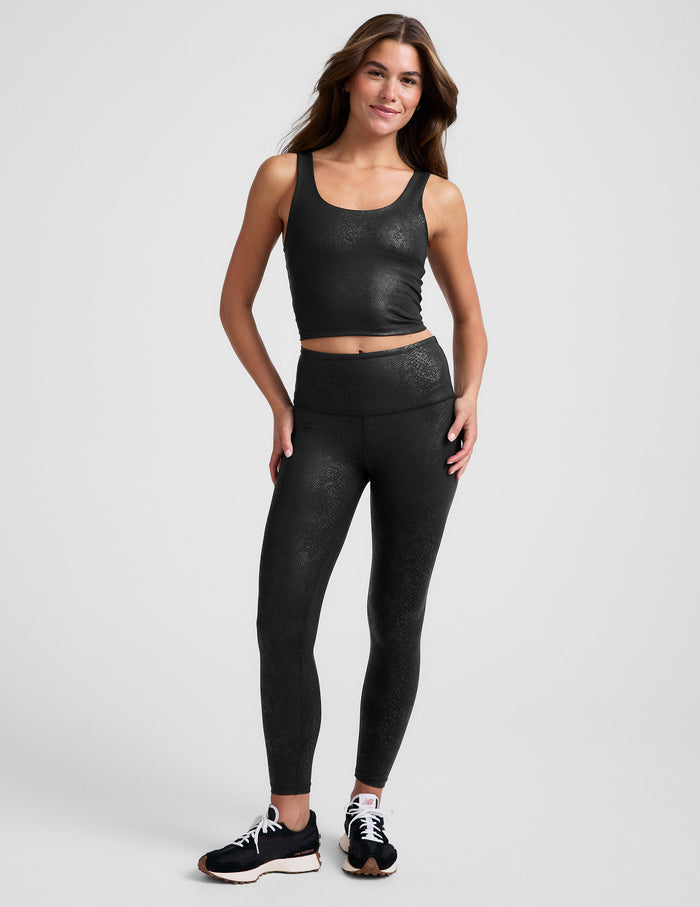 black viper print high-waisted midi leggings.