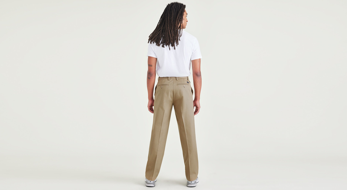 Back view of model wearing New British Khaki Signature Iron Free Khakis, Classic Fit with Stain Defender® (Big and Tall).