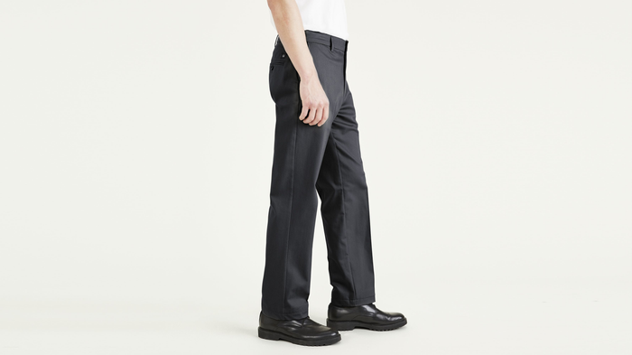 Side view of model wearing Steelhead Signature Iron Free Khakis, Classic Fit with Stain Defender® (Big and Tall).