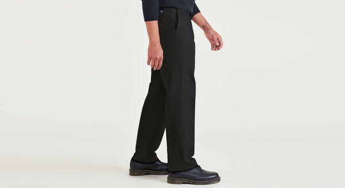 Side view of model wearing Beautiful Black Signature Iron Free Khakis, Classic Fit with Stain Defender® (Big and Tall).