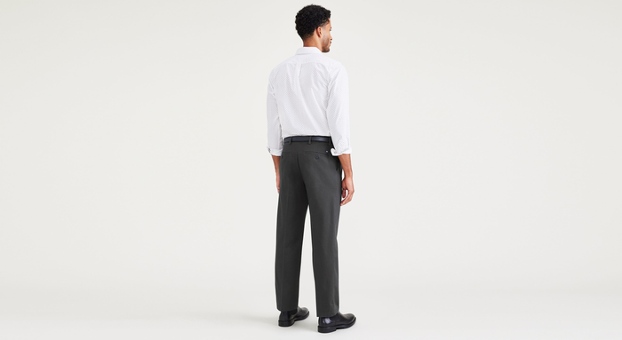 Back view of model wearing Steelhead Signature Iron Free Khakis, Pleated, Classic Fit with Stain Defender® (Big and Tall).