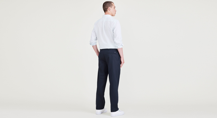 Back view of model wearing Navy Blazer Signature Iron Free Khakis, Pleated, Classic Fit with Stain Defender® (Big and Tall).