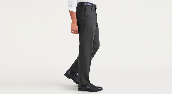 Side view of model wearing Steelhead Signature Iron Free Khakis, Pleated, Classic Fit with Stain Defender® (Big and Tall).